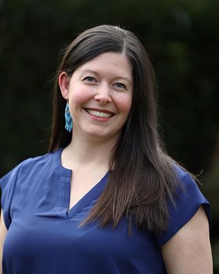 Photo of Jenn Moudahi